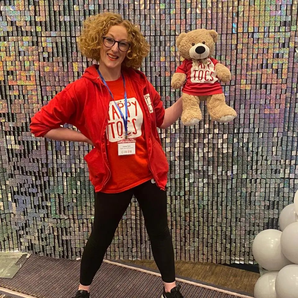 Emma Tyler teacher of Lichfield area Tappy Toes classes holding a teddy bear